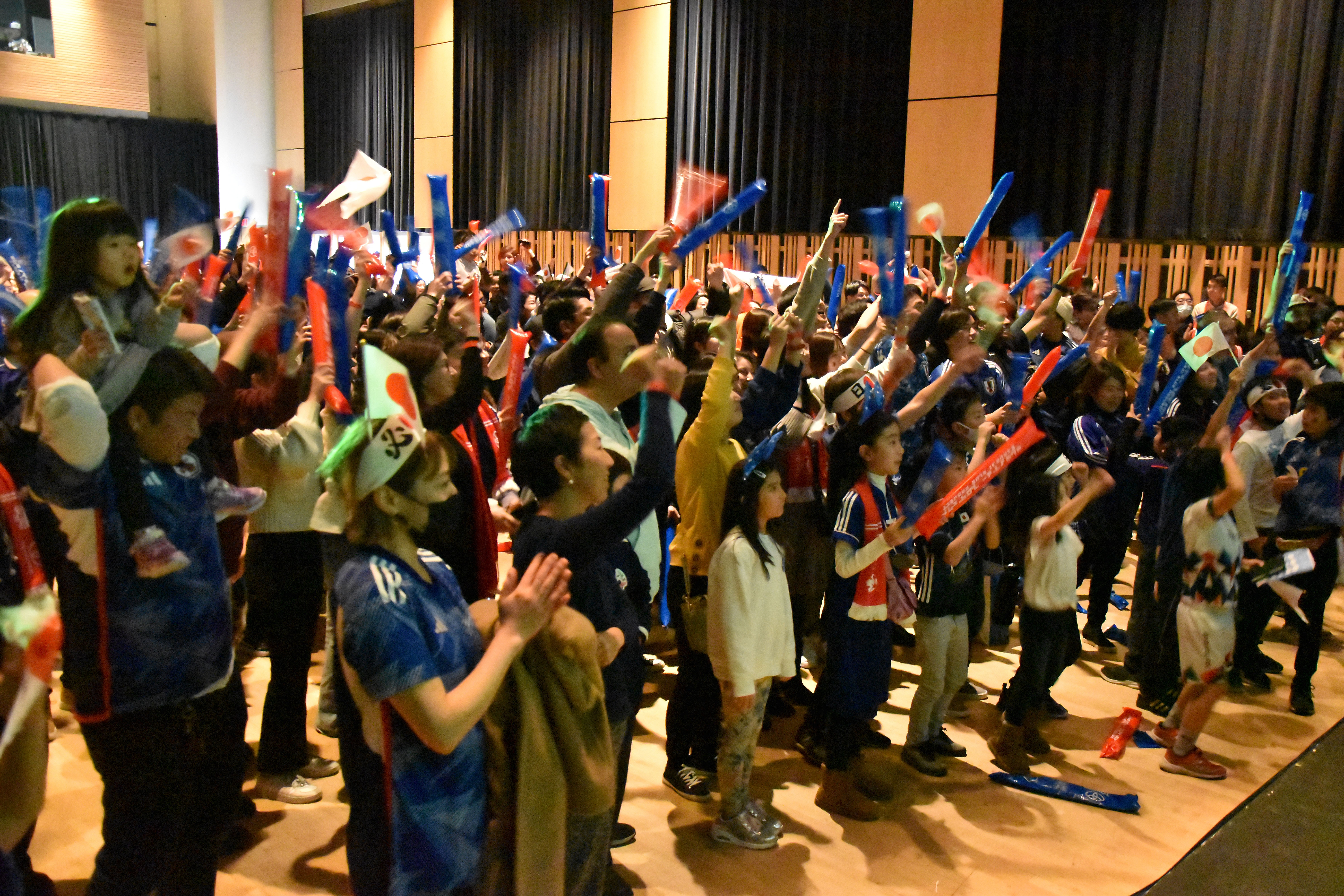 Fans cheer on the Samurai Blue
