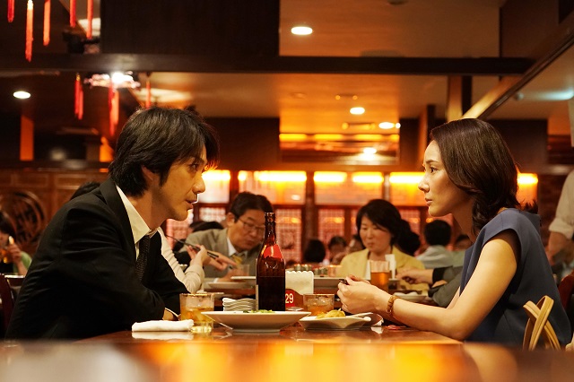 two people eating dinner