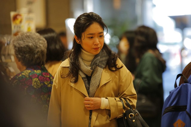 woman walking in city