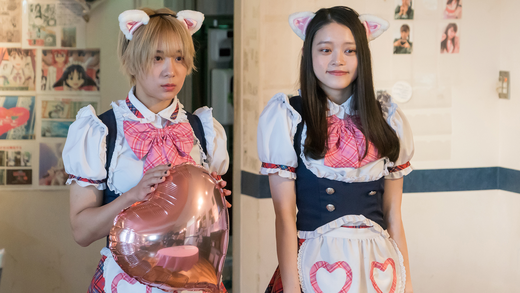 two kids in cute uniforms with cat ears
