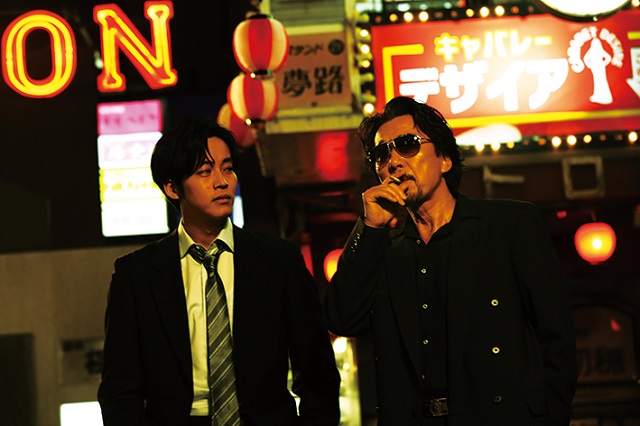 two men and one smoking