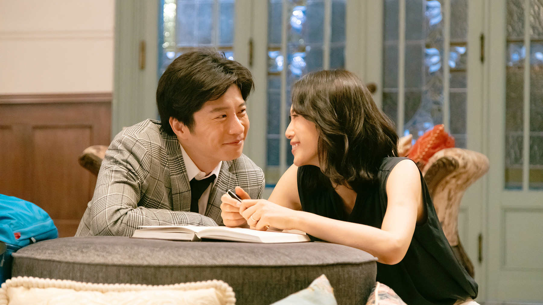 woman and man smiling at each other