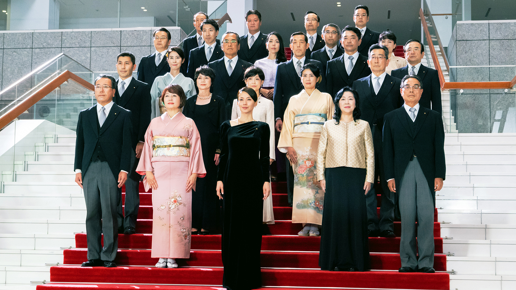 group of people on red stairs