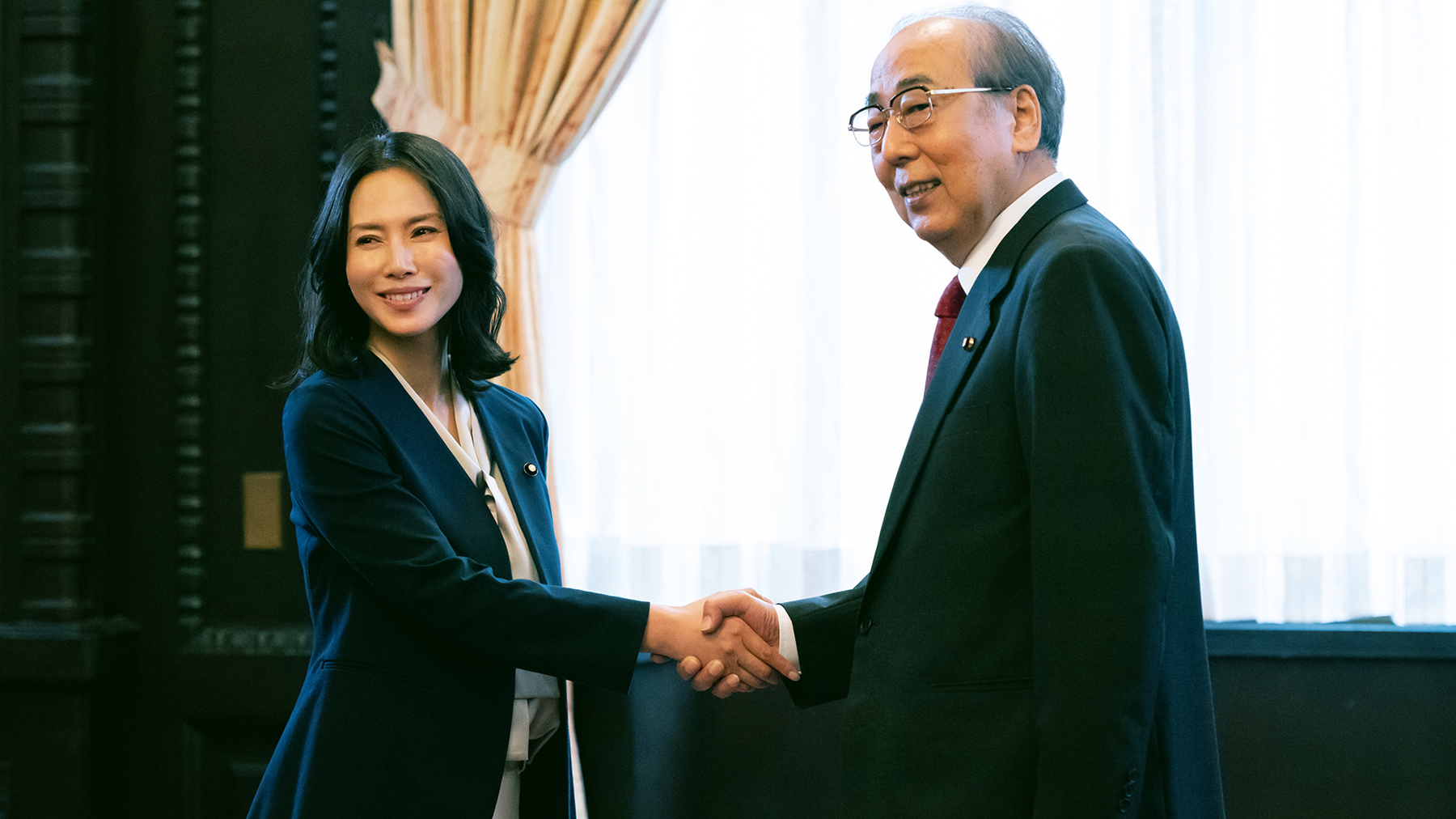 woman and man shaking hands