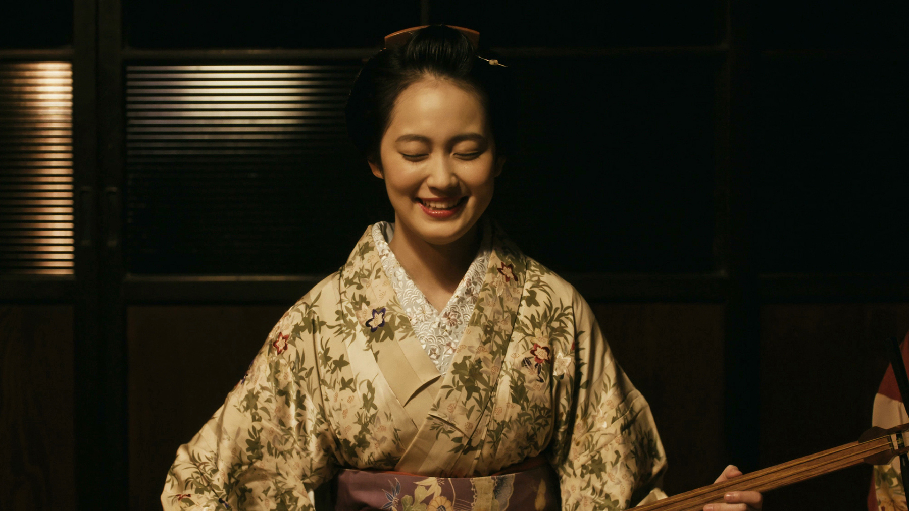 woman with shamisen