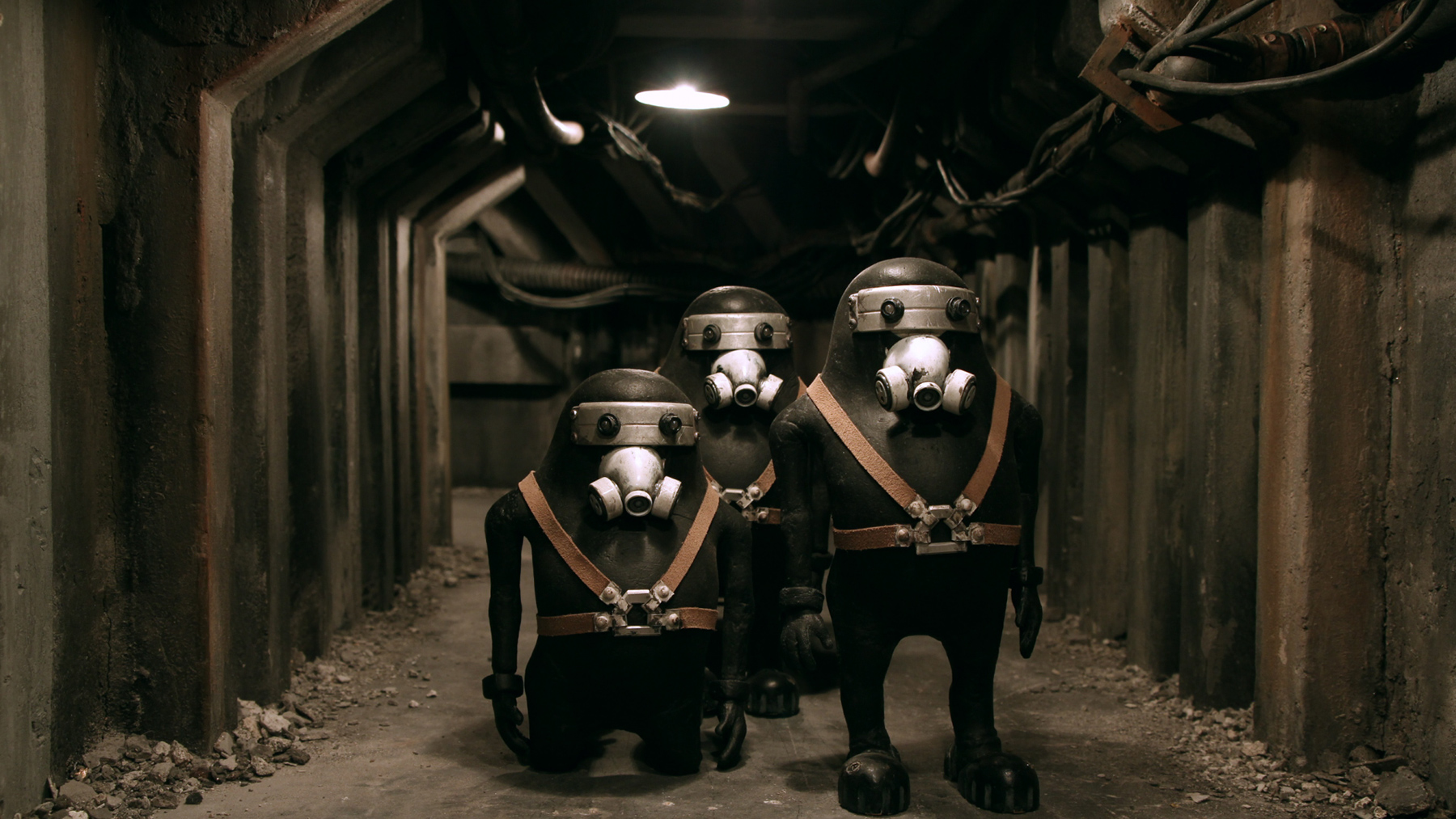 group of creatures wearing gas masks