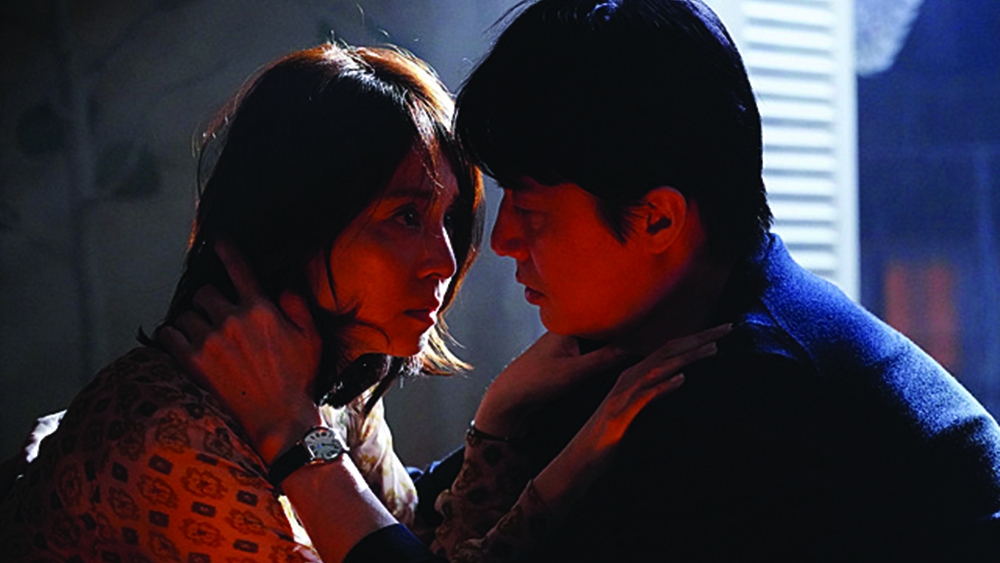 AT THE END OF THE MATINEE - man and woman facing each other