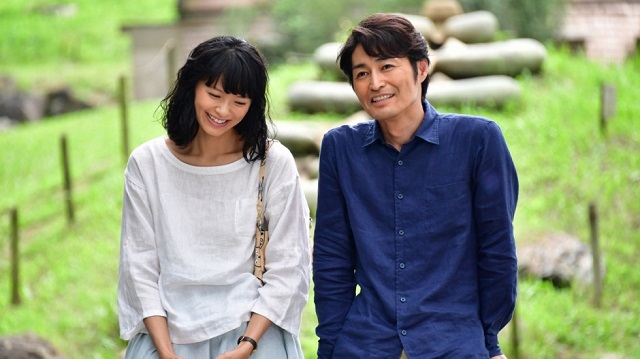 two actors sitting next to each other