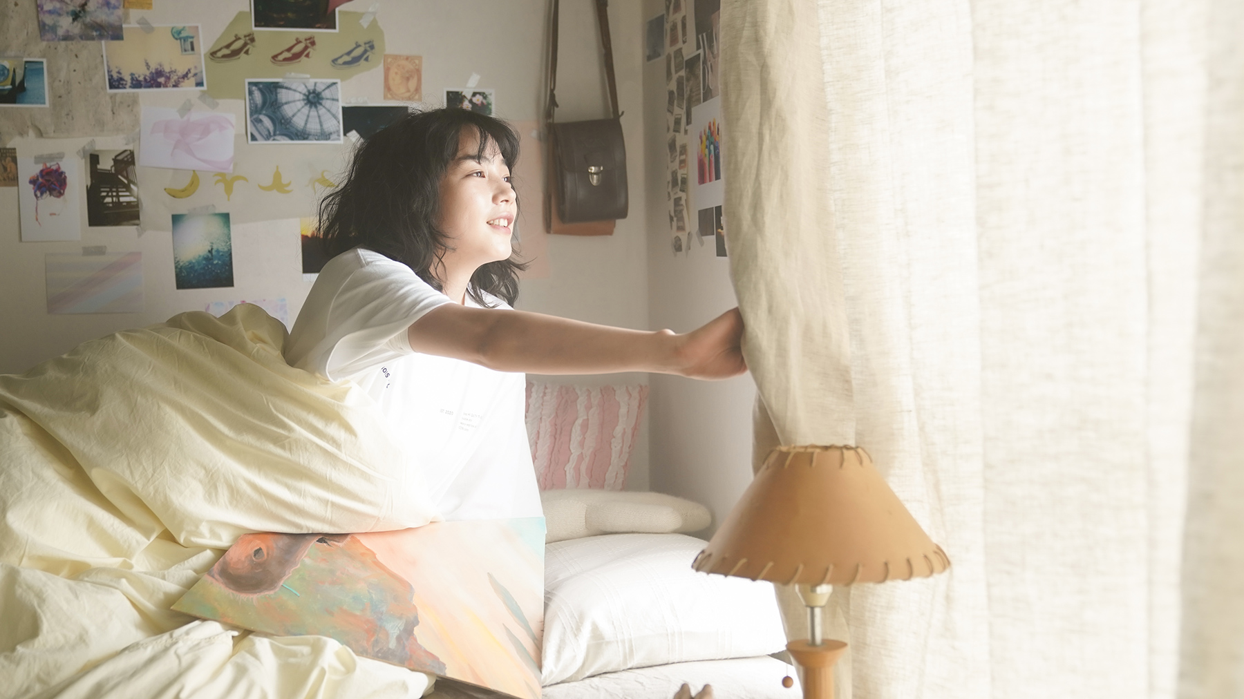 woman looking out of window