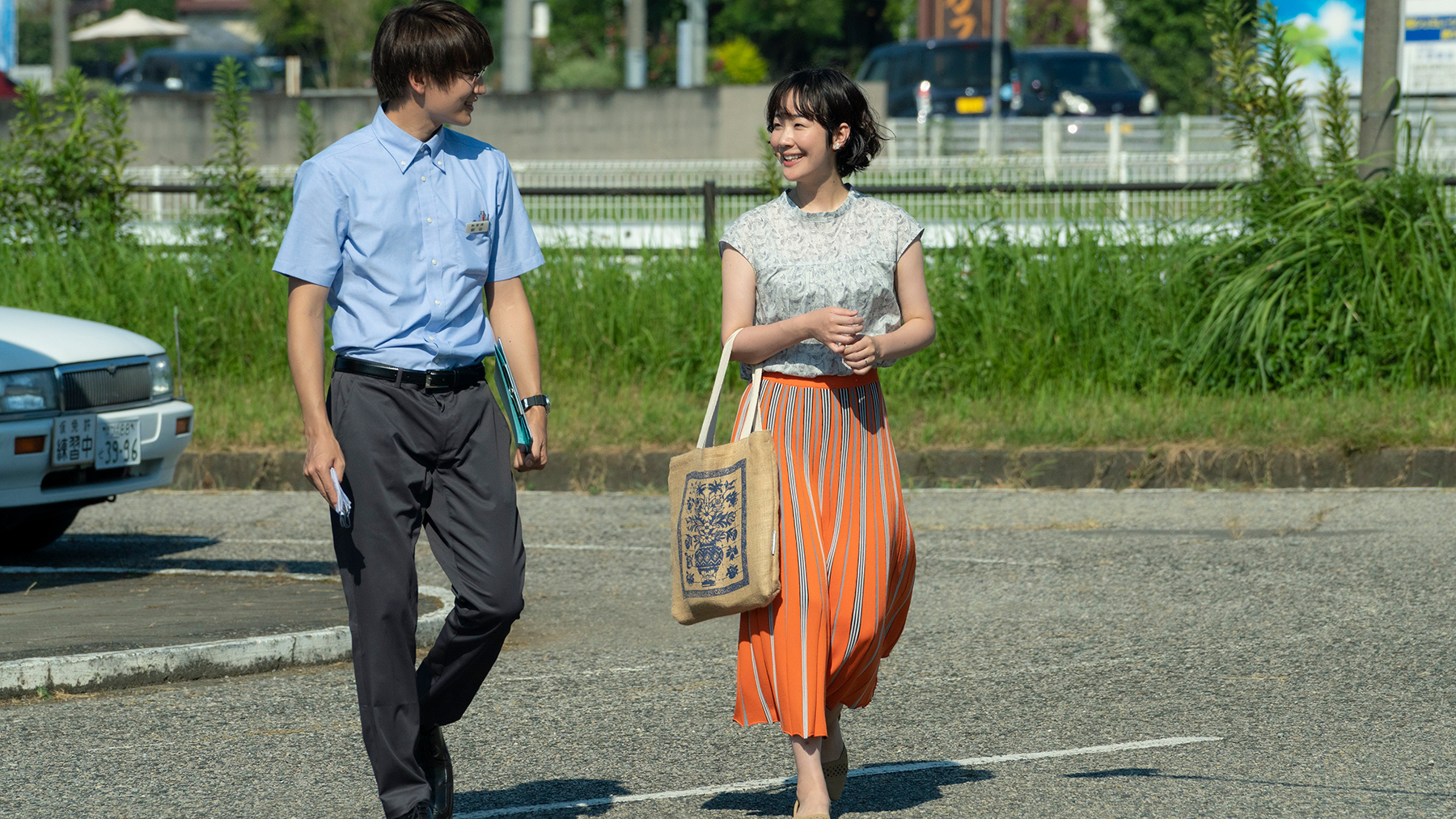 man and woman walking together