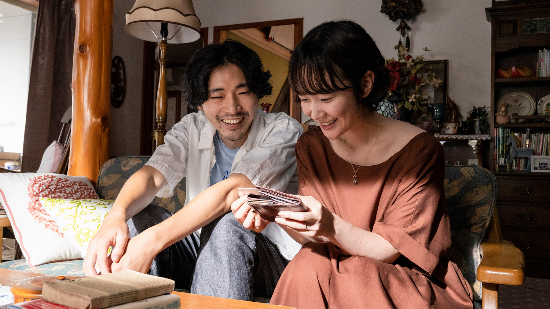 man and woman sitting next to each other