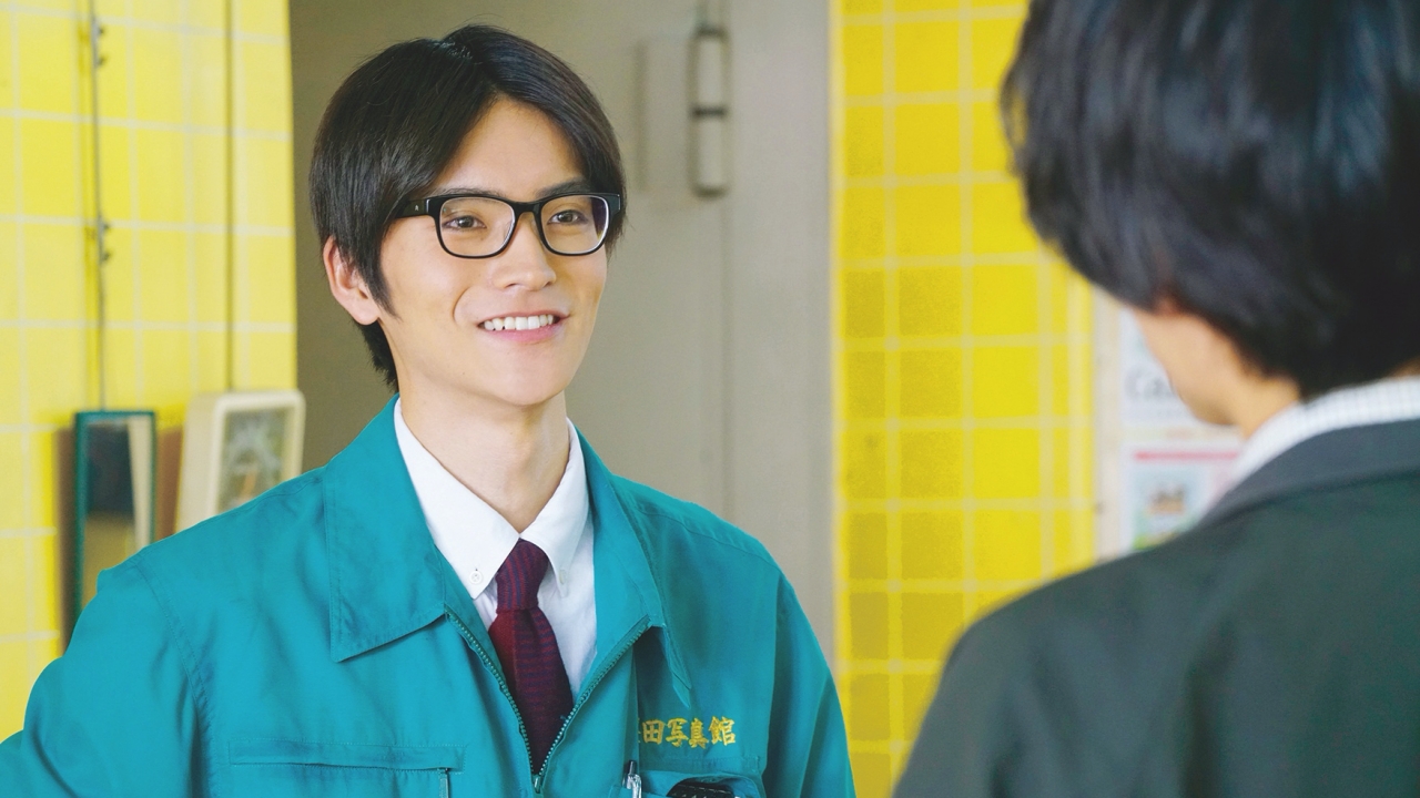 THE TRAVELLING CAT CHRONICLES a man in uniform