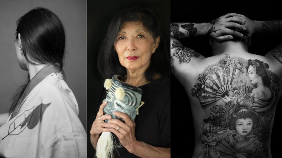 Wendy Tanaka stands between two of her photos. One the side profile of a woman and the other the back of a heavily tattooed man