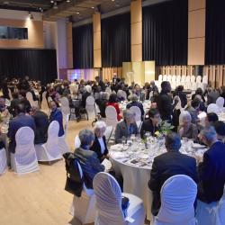 Round tables with guests done up for Sakura Gala in KH