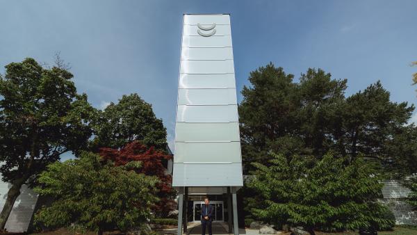 Jerry stands under the Ikeda Tower